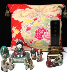 Japanese Silk Pillow Made From Kimono Plus Assorted, Miniature Figurines, And Display Objects.