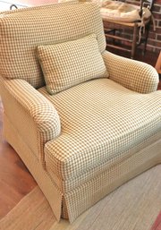 A Duralee Furniture Comfy Cozy Swiveling Armchair In A Tan Houndstooth Fabric.