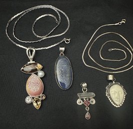 Sterling Silver 4 Assorted Pendants Plus 2 Necklaces