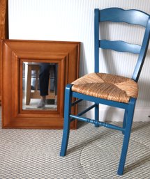 Blue Painted Chair With Woven Rush Seating & Wood Mirror With A Beveled Edge