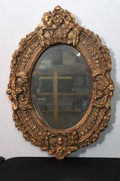 Highly Decorative Gold Oval Wall Mirror With Foliate Details