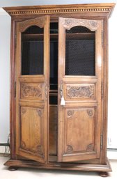 French Country Carved Oak Armoire With Chicken Wire Doors And Fitted Drawers.