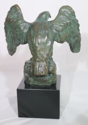 A Patinated Bronze Eagle Sculpture On Square Black Stand, Signed Julia Gilli.