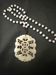 Nicely Carved Jadeite Pendant On A 24 Inch Beaded Rope Necklace