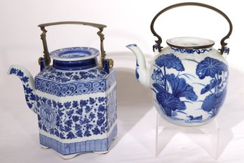 Two Vintage Chinese Blue And White Porcelain Teapots With Lotus Flowers And Brass Handles.
