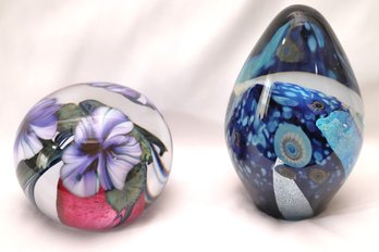 Two Stunning Art Glass Paperweights, By Eickholt And Lotton Studio Blue Ocean And Purple Flower.