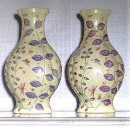 Pair Of Decorative Porcelain Vases With Yellow Background And Purple Leaves.