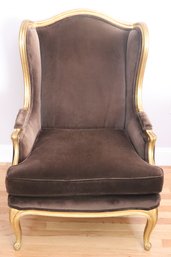 Luis XVI Style Gilded Wing Chair With Chocolate Brown Velvet Upholstery.