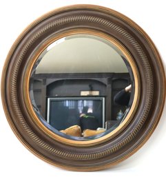 Decorative Circular Wall Mirror With A Beveled Edge