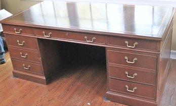 Kittinger Leather Top Executive Style Wood Desk With A Finished Back And Pull-out Extension