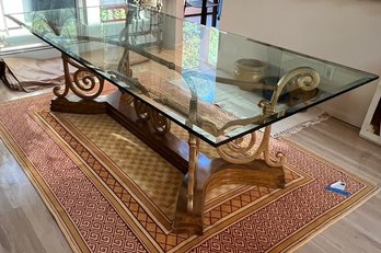 Elegant French Style Glass Top Dining Table With Gold Metal Scrolled Legs.