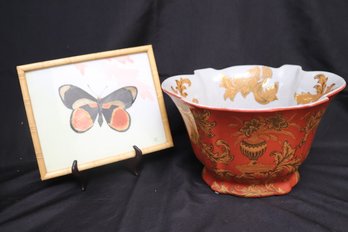 A Ceramic Centerpiece Bowl With Persimmon And Gold Flowers And Framed Butterfly.