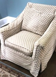 Cozy Swivel Rocker With Slipcover Covered In Muslin Ready For Custom Upholstery