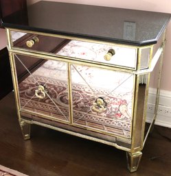 Mirrored Nightstand With A Marble Top