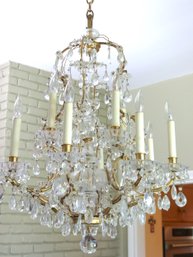 Louis XV Style Gilt Metal Chandelier With Sumptuous Crystals And Florets.