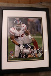 Autographed Photo From Super Bowl XLII With COA From Steiner.