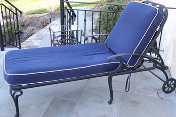 Black Aluminum Painted Outdoor Lounge Chair, With Blue Fabric Pillow.