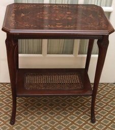 1920s Era Floral Inlaid Wood Side Table With Caned Lower Shelf.