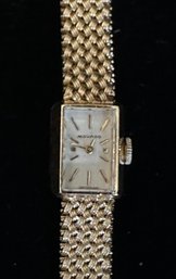 14K YG VINTAGE MOVADO LADIES WRIST WATCH SIZE 6.5 INCHES WORKING CONDITION