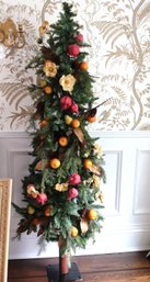 Large 6 Foot Decorative Fruit Pine Tree With Floral Accents On A Metal Base