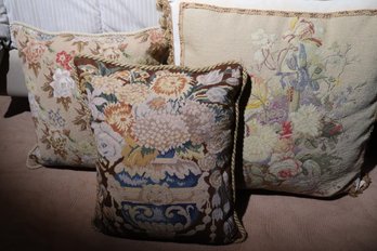Three Vintage Needlepoint Pillows With Different Floral Patterns.