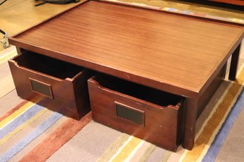 Pottery Barn Kids Coffee Table With Slide Out Storage Cubbies That Are On Wheels, Great For Hiding Toys