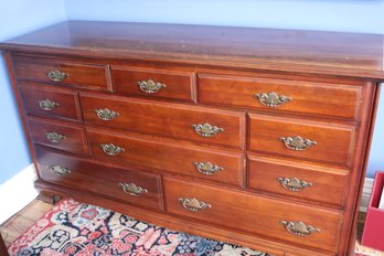 Colonial Style Cherry Wood Dresser With Plenty Of Storage Space.