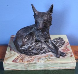 An Antique Metal Figurine Of A Seated Fox, On Green Onyx Base