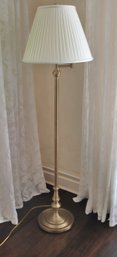 Brass Floor Lamp With Adjustable Swing Arm And A Silk Pleated Shade