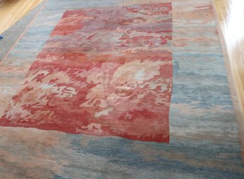 Custom-made Wool Area Rug With Abstract Design In Sunset Shades And Blue/gray Border.