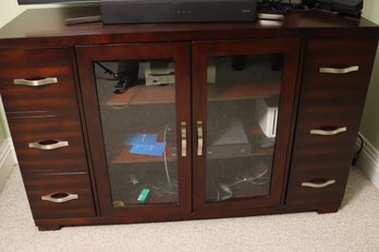 Devin 56 Inch TV Console With Glass Front Door And Plenty Of Storage.