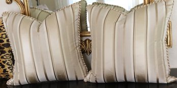Pair Of Fine Custom Pillows With A Striped Satin Like Material And Piping Along The Edges