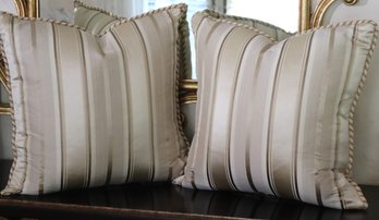 Pair Of Fine Custom Pillows With A Striped Satin Like Material And Piping Along The Edges