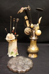 Two Vintage Hatpin Holders With A Wide Assortment Of Antique Hat, Pins, And A Pretty Hand Mirror In A Silver F