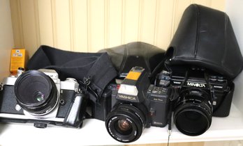 Lot Of Vintage Cameras, Including Nikon, Yashika, Minolta Vintage Cameras With Lenses And Film.