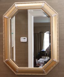 Italian Octagonal Beveled Mirror With Gold Frame And Florentine Style Accents.