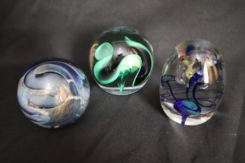 Three Vintage Signed Art Glass Paperweights.