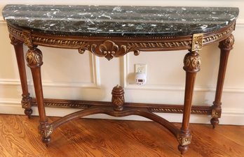 French Louis XV Style Carved Console Table With Black Marble Top.