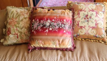 Decorative Pillows Including A Pretty Multi Toned Pillow With Stitched Floral Accents And Tassels And Needlepo