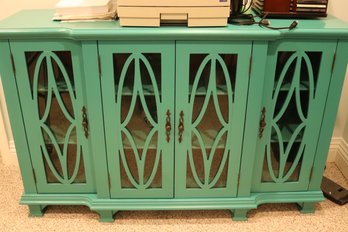 Turquoise Colored Bookcase Cabinet With Oval Mullions On Glass.  Front Doors