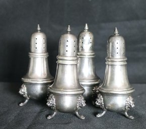 TWO PAIRS (4) STERLING SILVER FOOTED SALT AND PEPPER SHAKERS (NOT WEIGHTED)