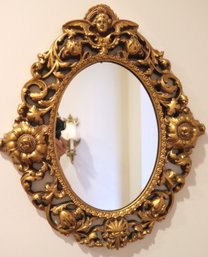 Gilded Carved Wood French Louis XV Rococo Style Wall Mirror With Angel Accent On The Top Approx 19 X 21 Inches