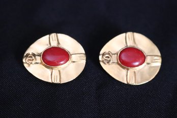 Vintage Chanel Oval Gold Tone Clip Earrings With Red Stone.