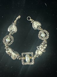 Sterling Silver 7 Inch Bracelet With Interesting Charms