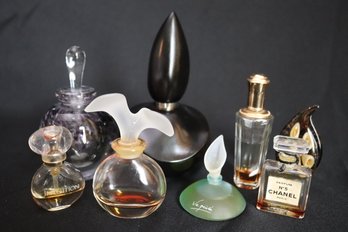 Lot Of 7 Perfume Bottles In Assorted Sizes And Small Art Glass Ornament.