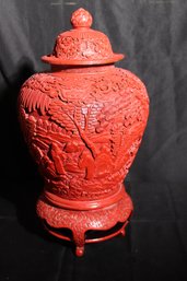 Gorgeous Large Chinese Cinnabar Lidded Urn With Beautiful Carved Exterior, On Cinnabar Stand