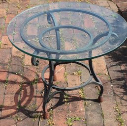 Wrought Iron Side Table With A Thick Glass Top