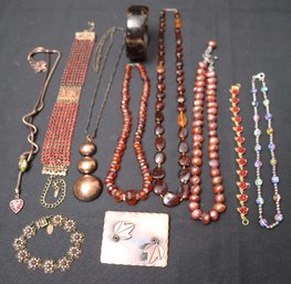 Assortment Of Vintage Necklaces Featuring Several Designers, Amber And Russet Color Pearls