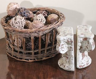 Pair Of Corinthian Column Terra Cotta Bookends And Twig Basket With Decorative Balls.