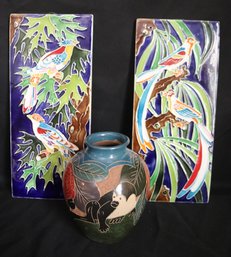Two Ceramic Hand Painted Wall Plaques With Exotic Birds And A Vase With Monkeys And Fruit.